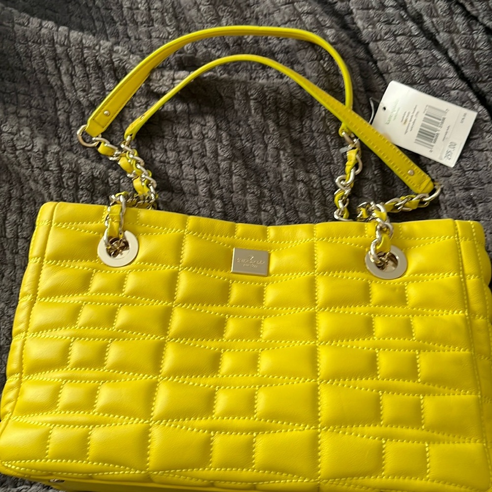 Kate Spade yellow signature spade leather.